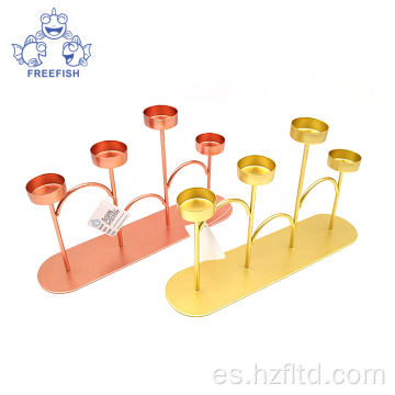 Juego de candelabros de metal dorado rosa con 4 brazos